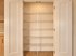Empty pantry with white wire shelving and double doors, ideal for kitchen organization.