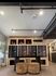 Modern apartment lobby featuring stylish seating, elegant decor, and a sleek mail center, showcasing a perfect blend of functionality and design.