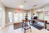 Inviting apartment entryway with natural light, stylish decor, and a welcoming ambiance.