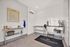 Modern pet wash station with sleek stainless steel fixtures, pristine white tile walls, and natural light through glass door.
