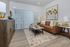 Modern open-concept living space with stylish kitchen, cozy seating area, and elegant decor.