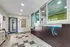 Interior view of the leasing office at The Reserve at Rye 290 with service counter and waiting area.