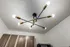 Modern ceiling light fixture in a studio apartment at The Reserve at Rye 290.