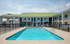 Property exterior with swimming pool.