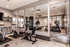 Modern fitness center with sleek exercise bikes, state-of-the-art cardio machines, and stylish decor for an invigorating workout.