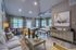 Inviting living area with chic decor, cozy seating, and natural light, ideal for vibrant gatherings and relaxation.