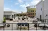 Modern rooftop terrace with stylish seating, lush plants, and scenic views, perfect for entertaining and relaxation.