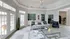 Luxurious living room with elegant decor, featuring large windows, stylish furniture, and a modern design.