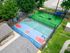 Inviting community amenities featuring a vibrant basketball court and a fun-filled dog play area with modern agility equipment.