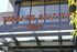 Elegant Terrace Station West sign with modern architectural accents and large glass windows, inviting urban lifestyle.