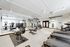 Modern fitness center equipped with high-tech treadmills, stationary bikes, and versatile strength training equipment, perfect for an invigorating workout.