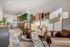 Inviting living space featuring modern furnishings and open kitchen.