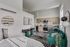 Chic studio apartment with modern kitchen, stylish decor, and cozy living area.