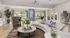 Elegant and spacious living room with stylish curved sofa, vibrant decor, and large windows offering lush garden views.