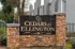 Charming stone entry sign for Cedars at Ellington, offering welcoming community vibes and elegant living.