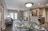 Chic open-plan living space with elegant dining set, stylish decor, and a modern kitchen perfect for entertaining.