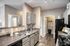 Chic modern kitchen with sleek countertops, stylish cabinetry, and inviting open layout.