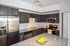 Sleek modern kitchen featuring stainless steel appliances, dark wood cabinets, and a stylish granite countertop with vibrant lemon accents.