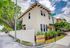 Charming corner townhouse for rent with 3 bedrooms, 2 and a half baths, lush landscaping, and bright exterior. Perfectly located along Federal Hwy, offering spacious living in a serene neighborhood.