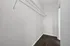 Spacious walk-in closet with modern shelving, perfect for maximizing storage and organization.