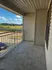 Charming balcony with scenic countryside view, perfect for relaxing and enjoying nature.