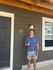Inviting apartment entrance with modern dark wood paneling and a cheerful atmosphere.