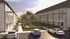 Charming apartment complex with modern architecture, lush gardens, and ample parking in a serene setting.