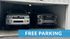 Convenient garage offering free parking with two SUVs, ensuring ample space and security for vehicles.