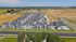 Aerial view of the front buildings, pool and clubhouse at The Residences at Victory Ranch