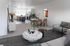 Open-concept living room and kitchen in an Erin Hills Estates townhome