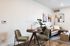 Apartment dining nook and living area with modern decor at Tradition Pointe