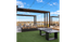 Rooftop terrace with lawn, pergola and city views at Tradition Pointe