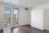 Bright and airy apartment room at Tradition Pointe