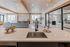 Clubhouse kitchen island overlooking the resident lounge at The Residences at Victory Ranch in Idaho Falls