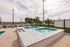 Outdoor hot tub next to the pool at The Residences at Victory Ranch in Idaho Falls