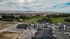 Aerial view of the apartment community with mountain views at The Residences at Victory Ranch in Idaho Falls
