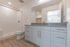 Primary bathroom with a large vanity and walk-in shower at The Residences at Victory Ranch in Idaho Falls