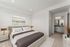 Furnished primary bedroom with an en suite bathroom at The Residences at Victory Ranch in Idaho Falls