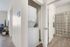 Charming apartment with in-unit laundry, elegant bathroom, and cozy living space, perfect for comfort and convenience.
