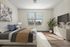 Bright and inviting bedroom with modern decor, featuring a cozy bed, stylish artwork, and a large window with serene views.