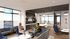 Elegant lounge area with modern furnishings, featuring spacious seating and natural light from large windows, creating a warm and inviting atmosphere.