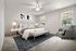 Elegant bedroom with plush gray bed, modern art, cozy armchair, and natural light streaming through large windows.