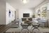 Bright, modern living room with elegant furniture, large windows, and contemporary decor, creating a welcoming atmosphere.