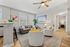 Inviting living room with modern furniture, soft lighting, and elegant decor, perfect for relaxation and entertaining.