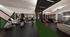 Contemporary fitness center with cutting-edge exercise equipment, mirrored walls, and striking geometric design elements.