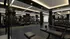 Luxurious modern gym with high-end equipment, sleek black decor, and ample workout space.