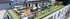 Vibrant rooftop deck featuring modern lounge seating, a shaded pergola, and lively social gatherings, perfect for entertainment.