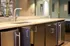 Elegant kitchen with modern fixtures, sleek countertops, and stylish cabinetry offering a contemporary vibe.