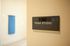 Inviting yoga studio entrance with a sleek, modern sign, perfect for wellness-focused living.