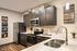 Modern kitchen with sleek stainless steel appliances, dark wood cabinets, and elegant decor, creating a stylish and inviting cooking space.